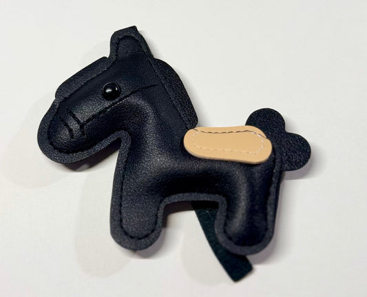 Black bag charm