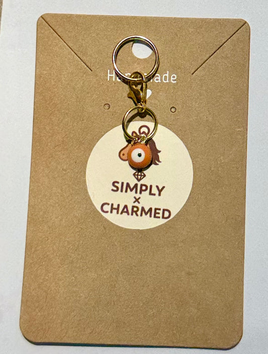 Orange evil eye
