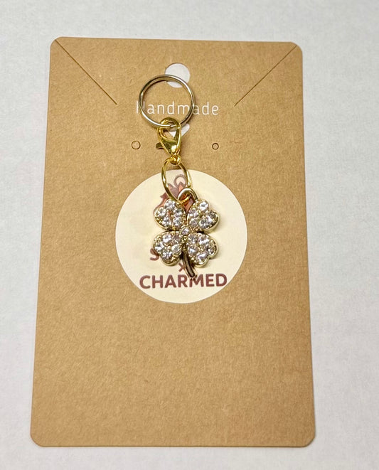 Gold sparkly clover